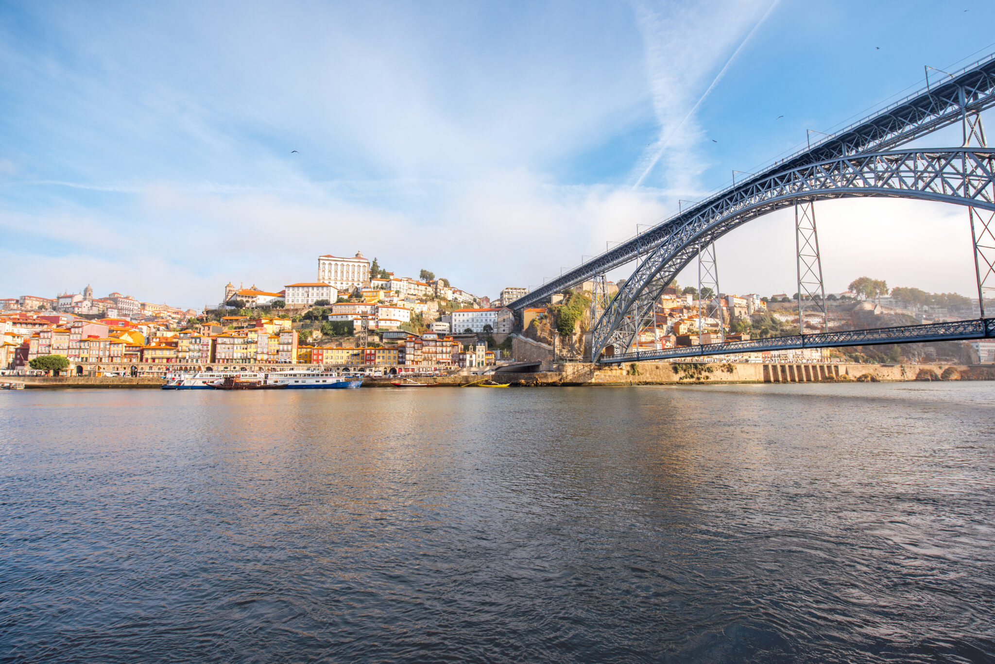Landscape view on the old town with Luis bridge and Douro river in Porto city, Portugal